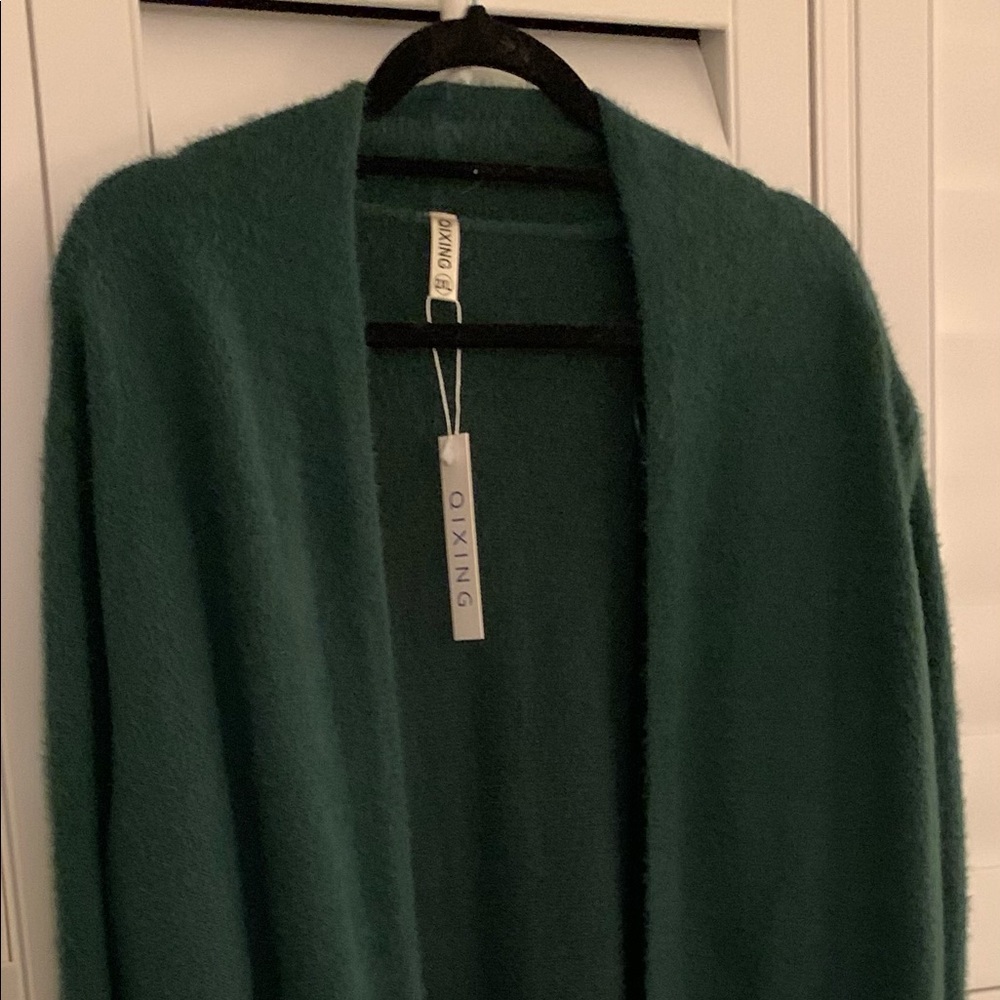 Green wool 3/4 length open cardigan.